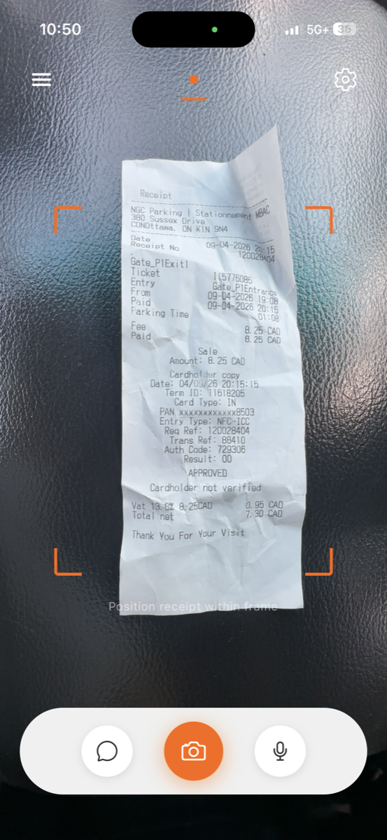 Spentrax AI receipt scanning in real time with a Canadian parking receipt in the camera frame